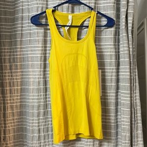 yellow swiftly tank